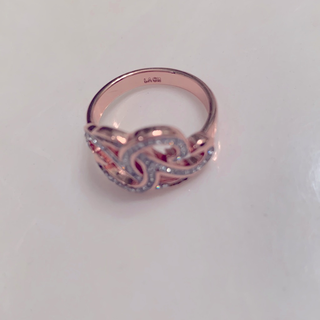 Rose Gold Colored Ring With Cut Stone
